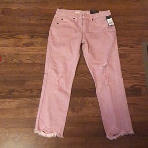 Pink ripped jeans